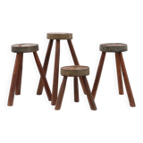 Brutalist French 1850s solid oak tripod stools with metal rim, set of 4