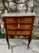 Charming small chest of drawers in precious wood marquetry.