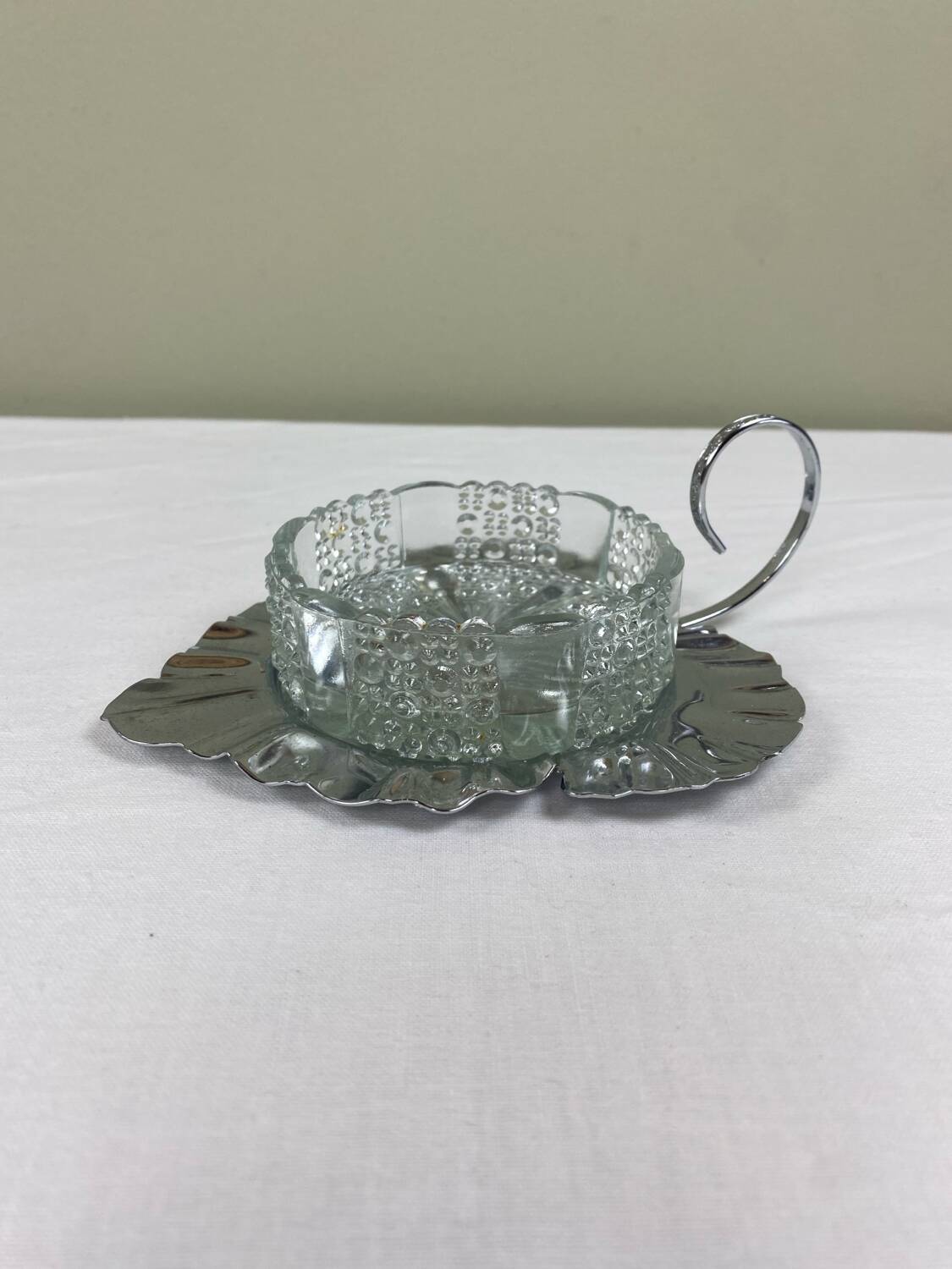 Metal and glass bowl