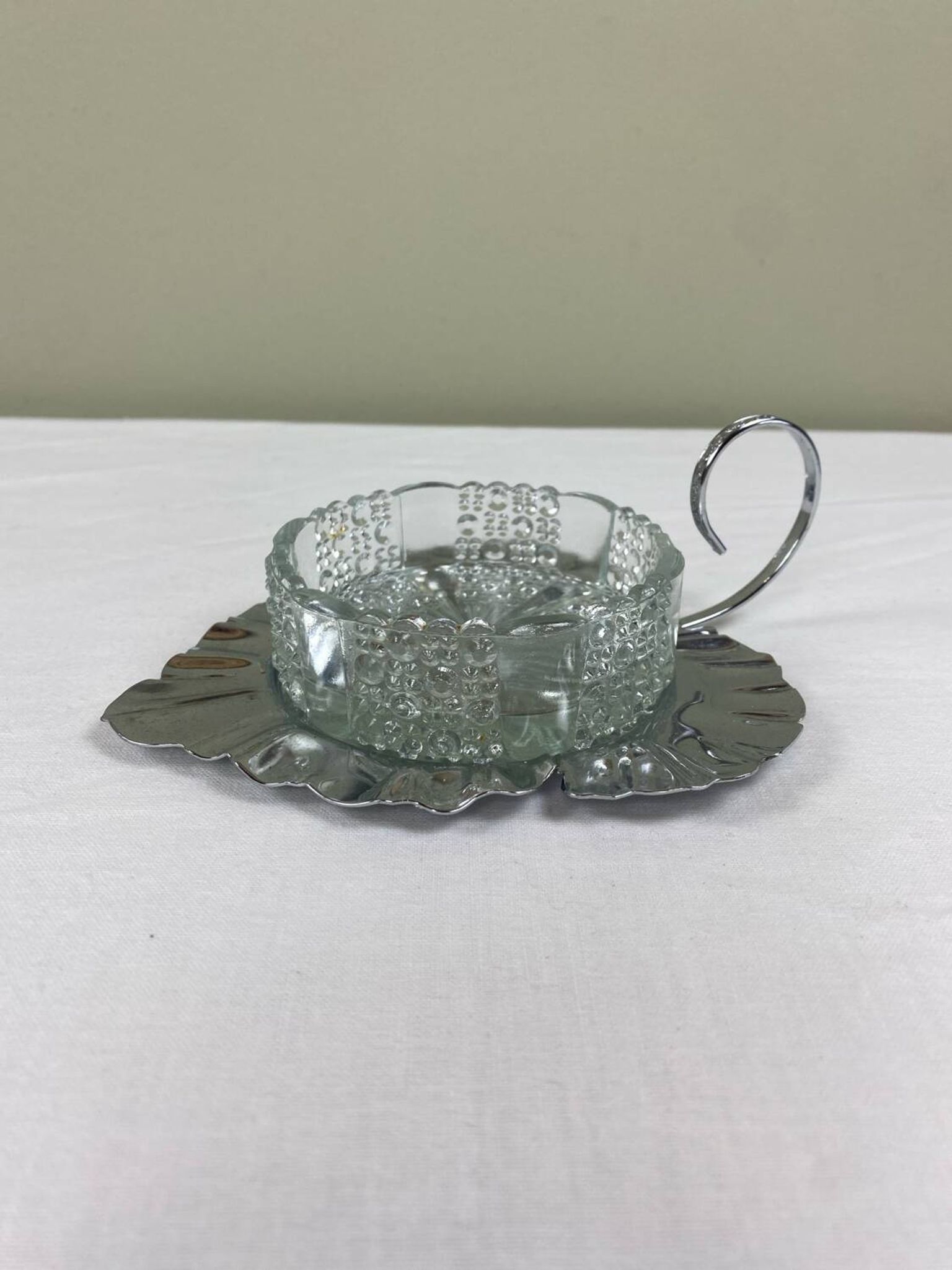 Metal and glass bowl