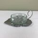 Metal and glass bowl