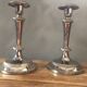 Silver metal candle holders that can be paired.