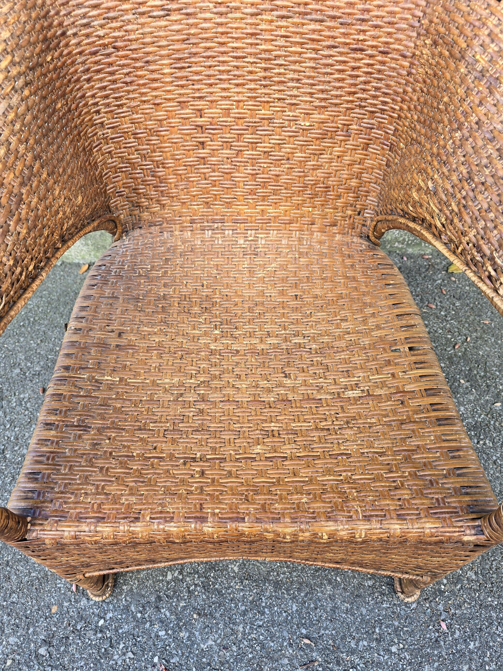 Arts & Crafts armchair in wicker and rattan attributed to Dryad & Co, UK, circa 1920.
