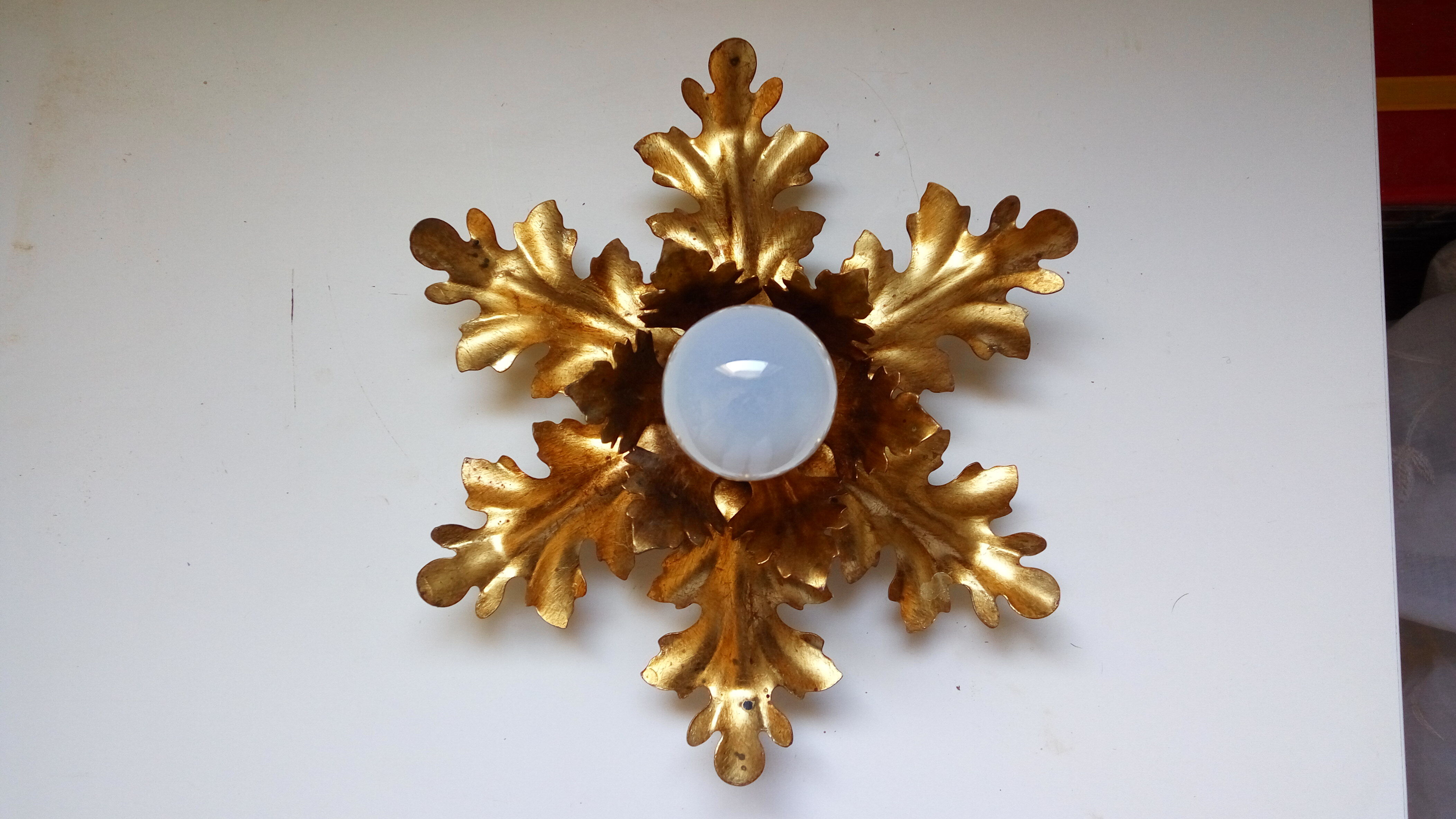 Golden metal wall light