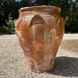 Ancient terracotta pottery jar