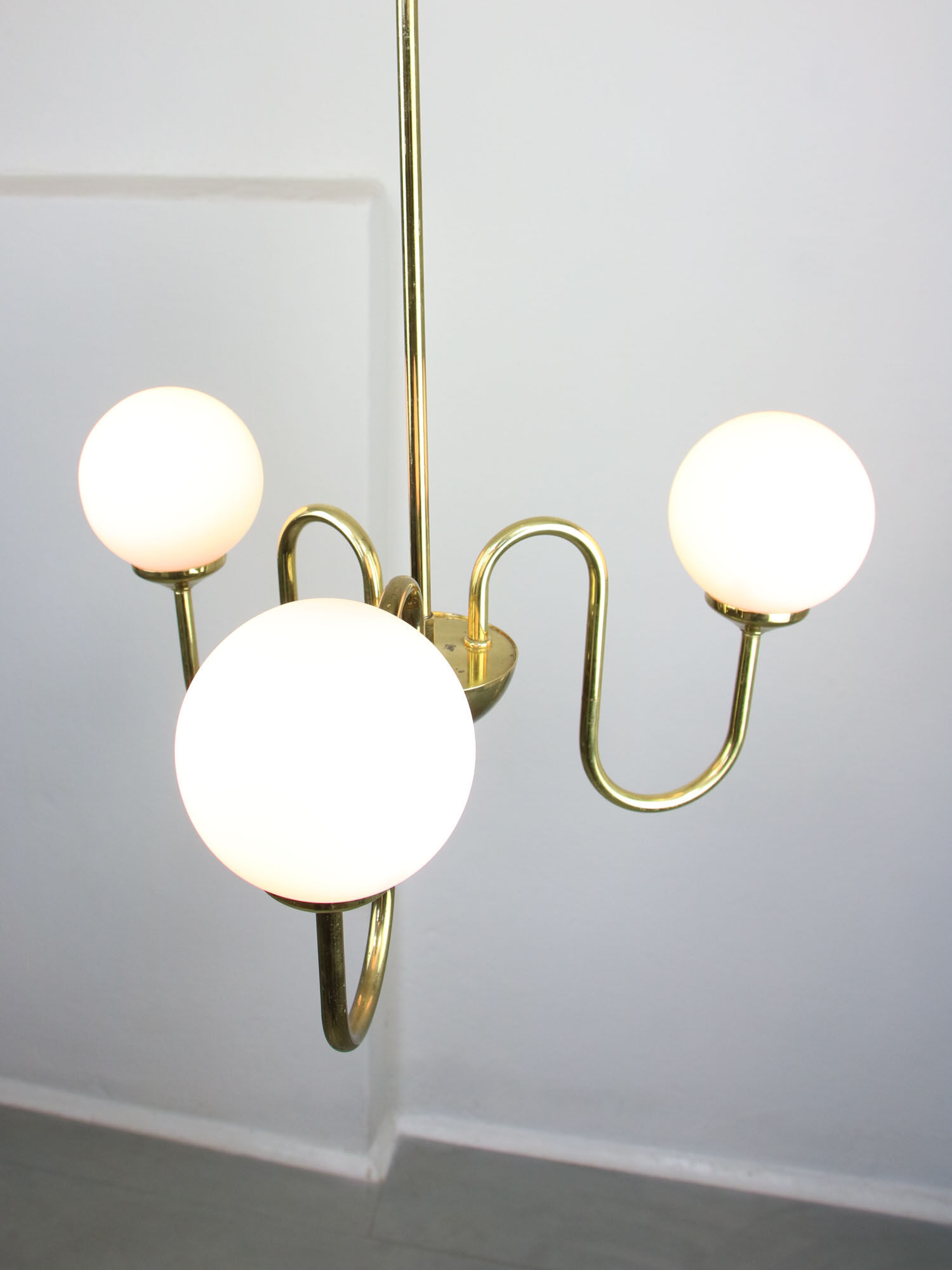Vintage golden chandelier in opaline glass