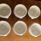 8 white lion head soup bowls with blue edging