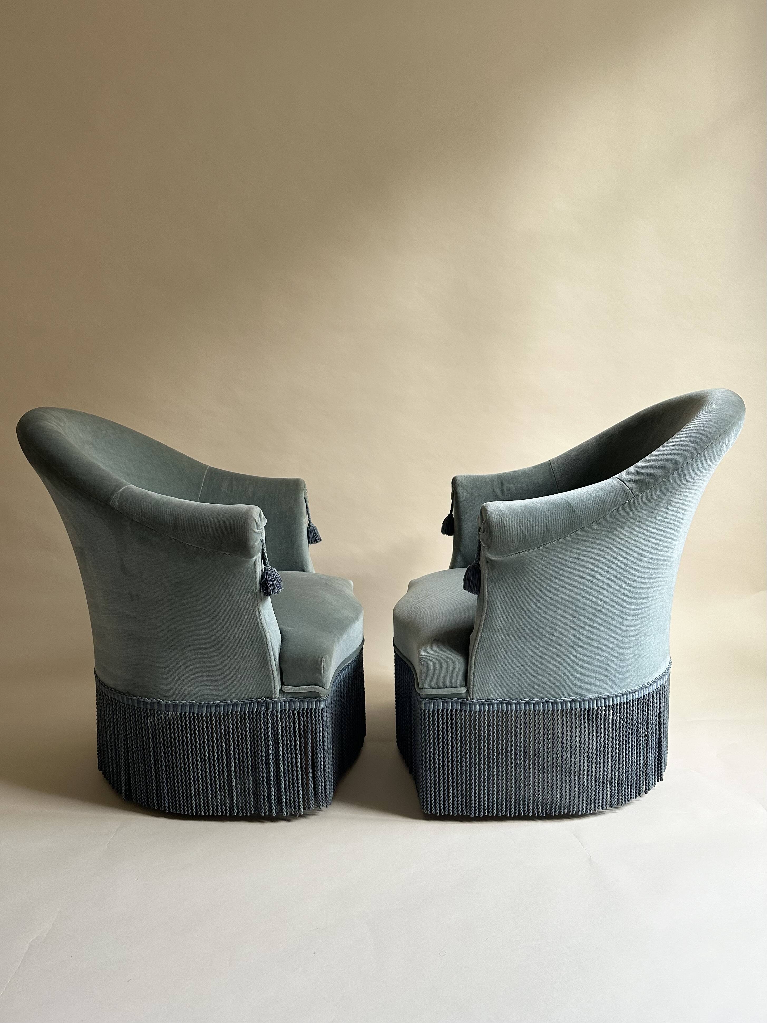 Blue velvet frog armchairs