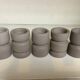 Five matte gray candle holders
