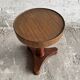Vintage round side table in solid dark brown wood — compact tripod base, classic 1940s-1950s style