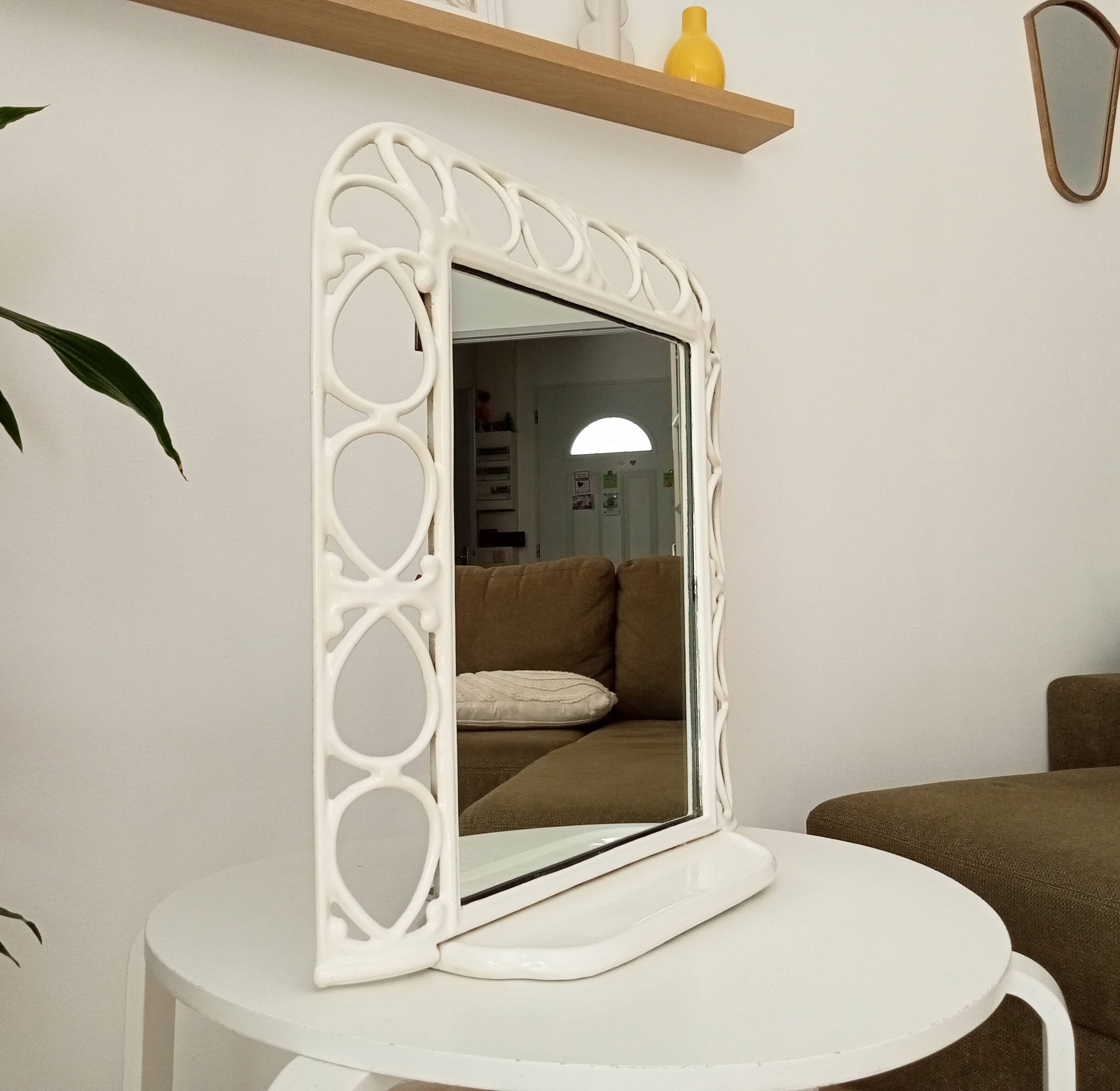 Antique 1930s enamelled cast iron shelf mirror