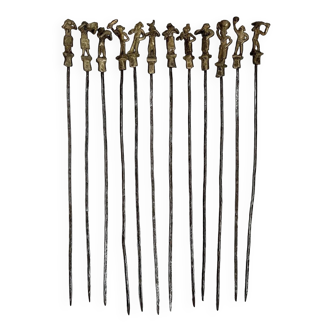 12 bronze African skewers