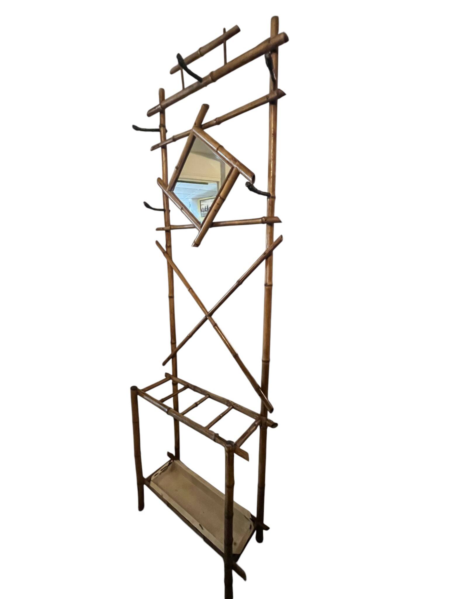 Art Deco, coat rack with bamboo mirror, diamond shape, around 1930.