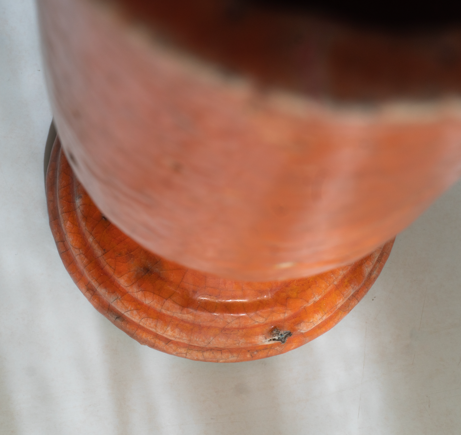 Orange glazed terracotta vase