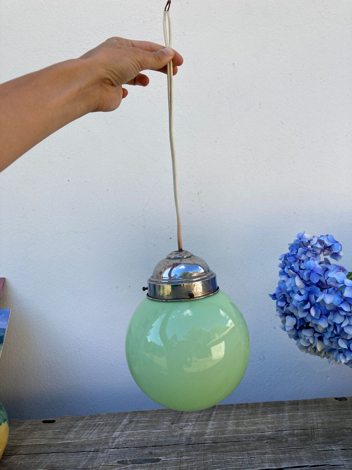 Suspension ball in art deco green glass 1930