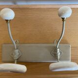 Wall-mounted coat rack with ceramic