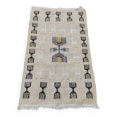 Handwoven kilim rug in natural wool
