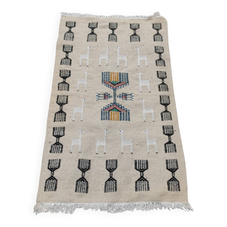 Handwoven kilim rug in natural wool