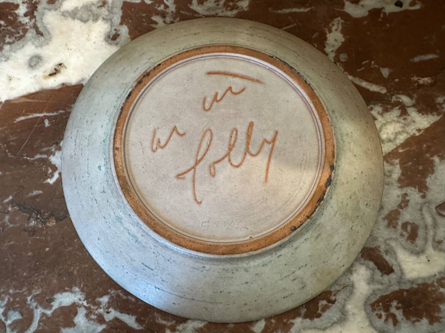 Ceramic plate signed by Marie-Madeleine Jolly – thistle decoration – year