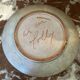 Ceramic plate signed by Marie-Madeleine Jolly – thistle decoration – year