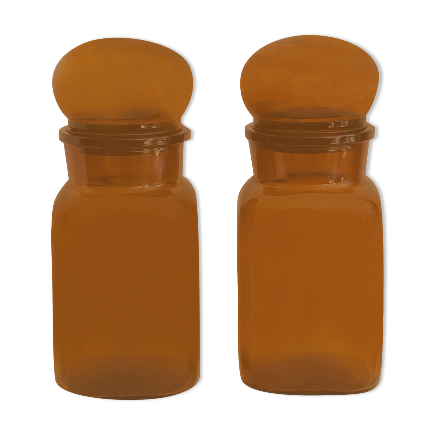 Pair of vintage amber glass jars