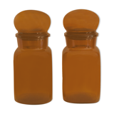 Pair of vintage amber glass jars