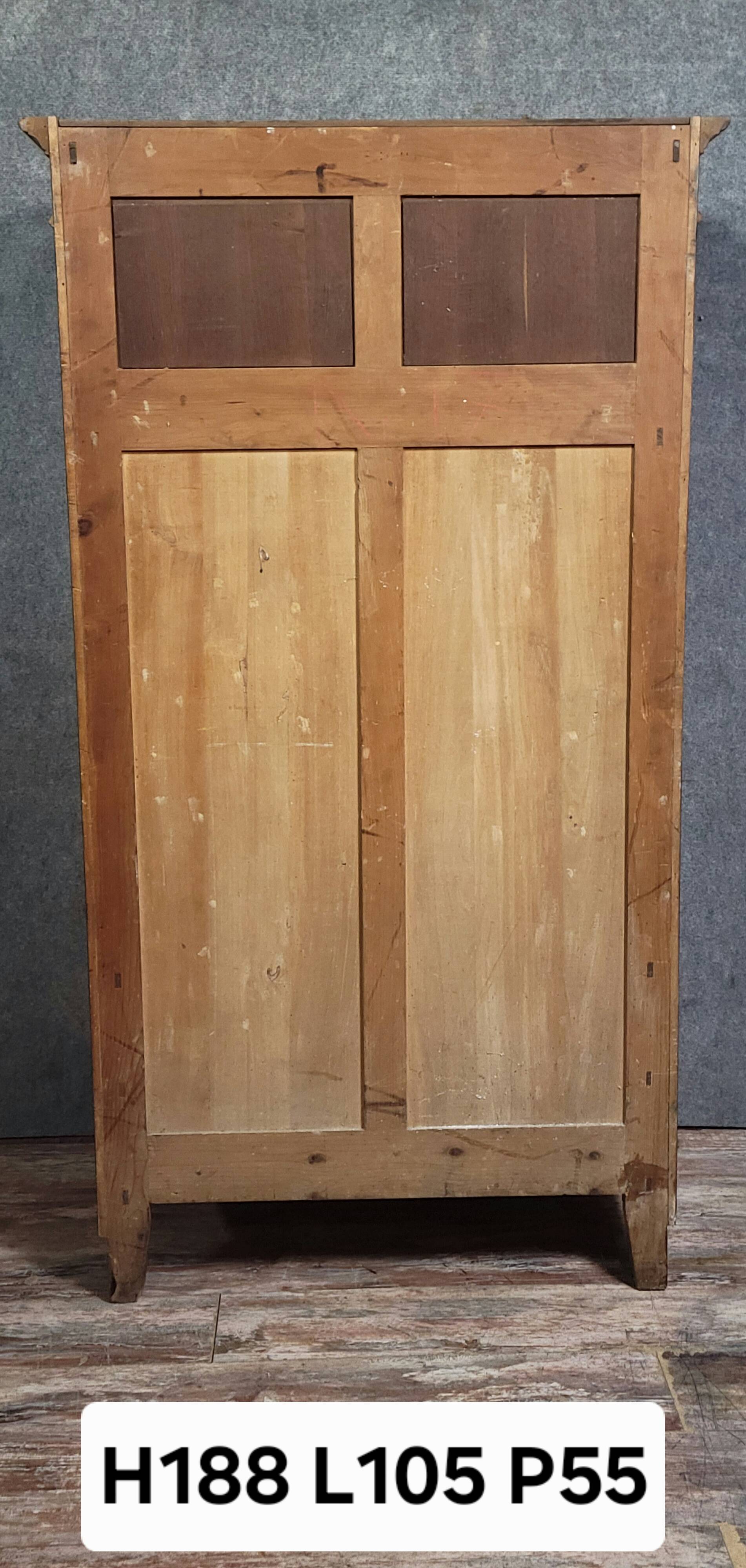 Rare Biedermeier guillotine secretary, made of walnut and marquetry.
