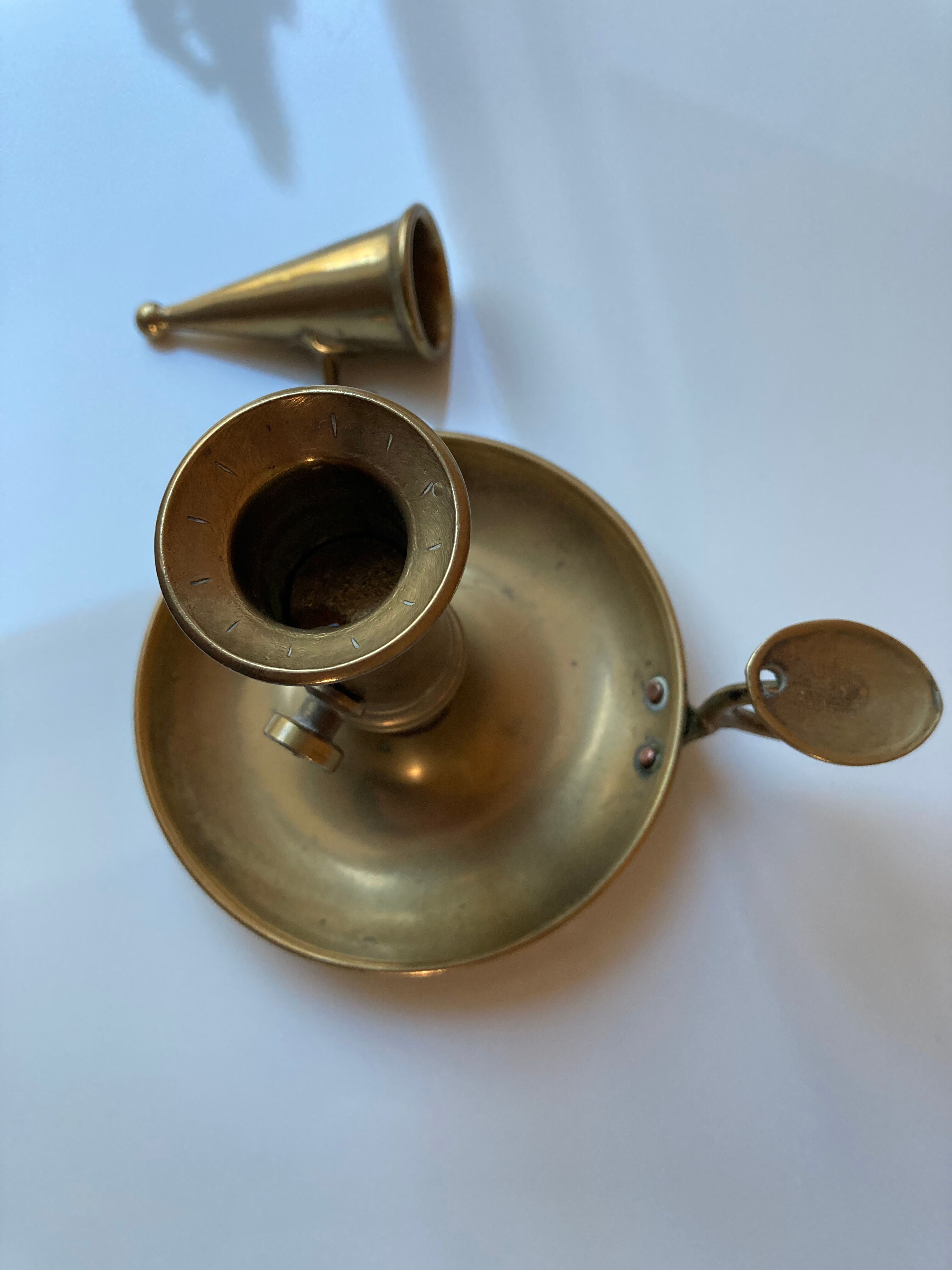 Brass hand candle holder