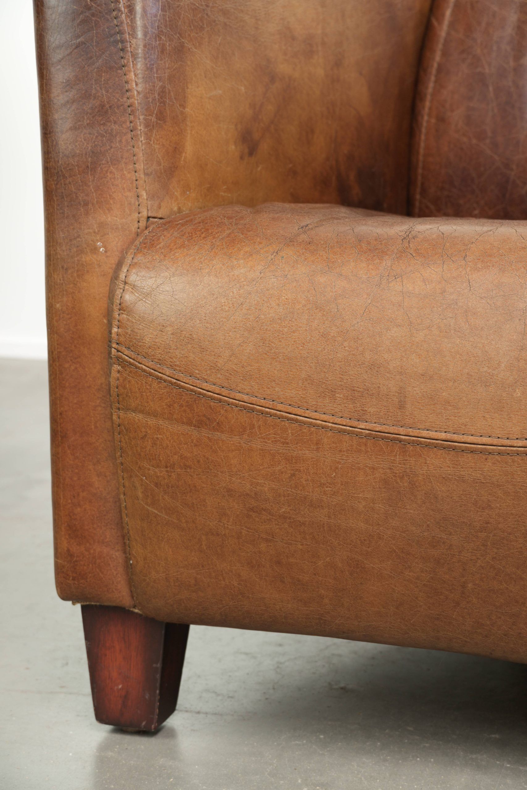 Fauteuil design aviateur en cuir de vache couleur cognac intemporelle