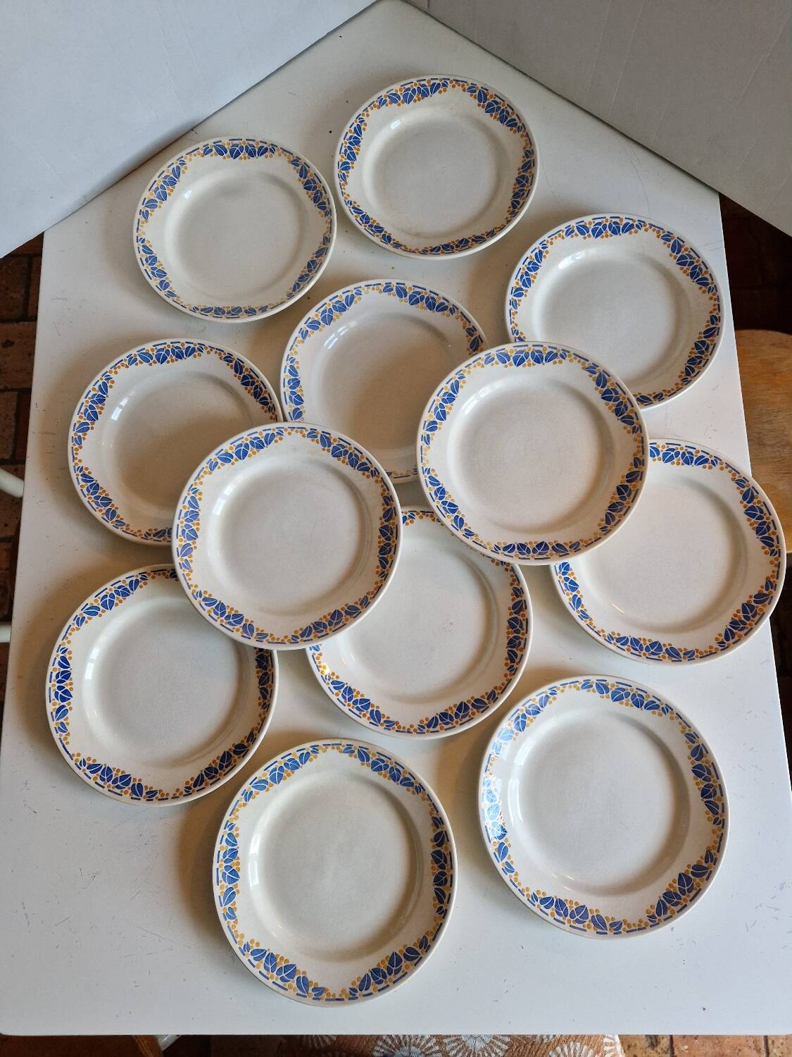 Set of 12 antique Art Deco plates, earthenware from Creil Montereau.