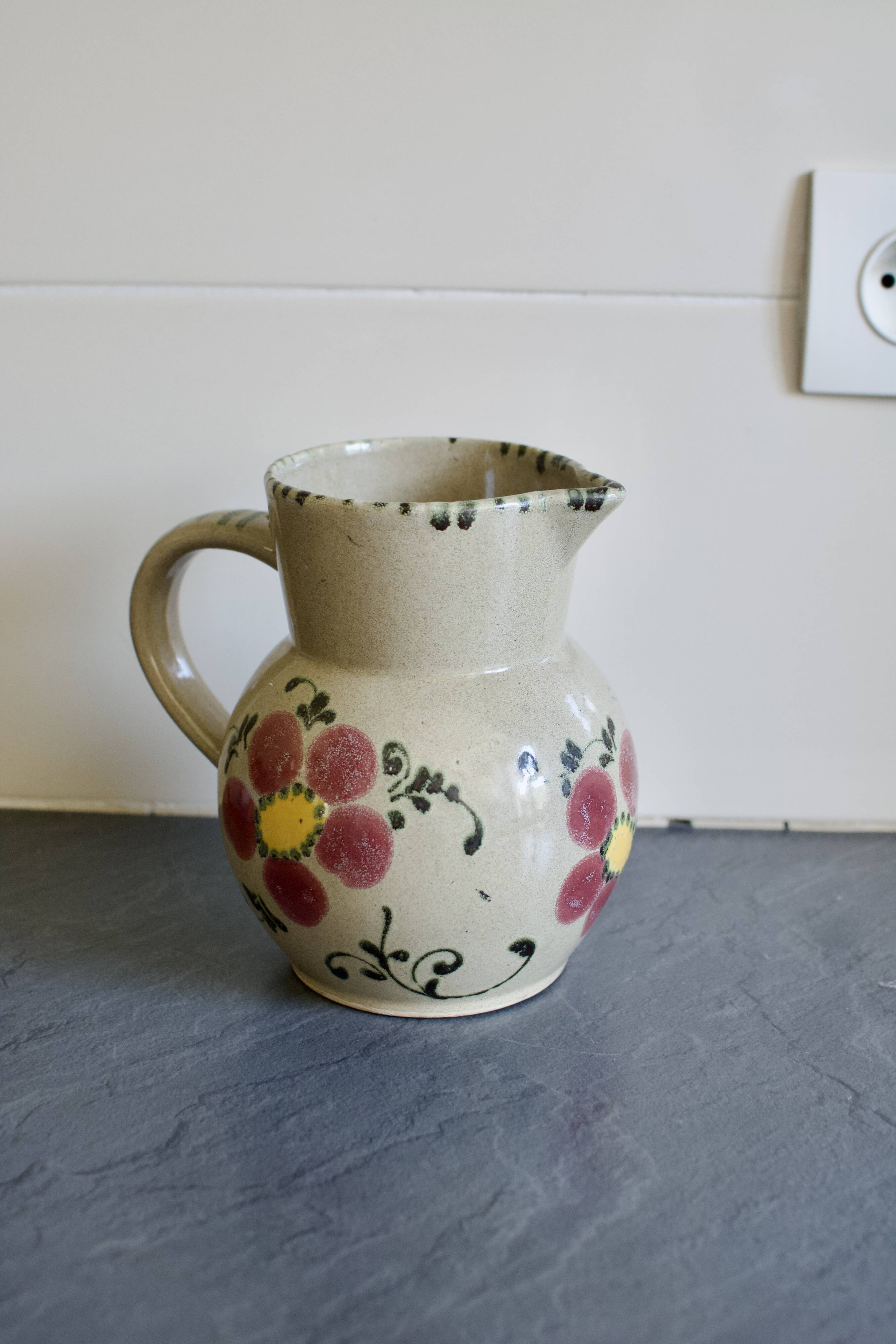 Vintage ceramic pitcher model flowers