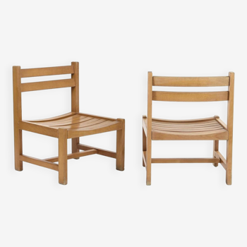 Pair of low chairs by André Sornay, circa 1960