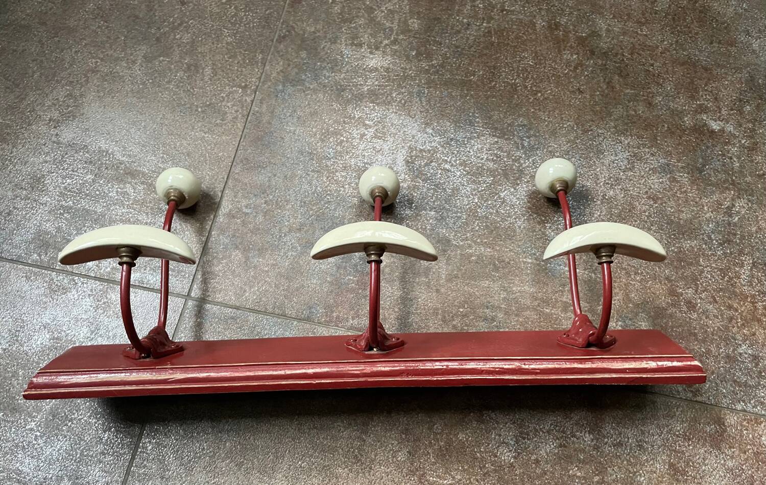 vintage wall coat rack in wood and porcelain