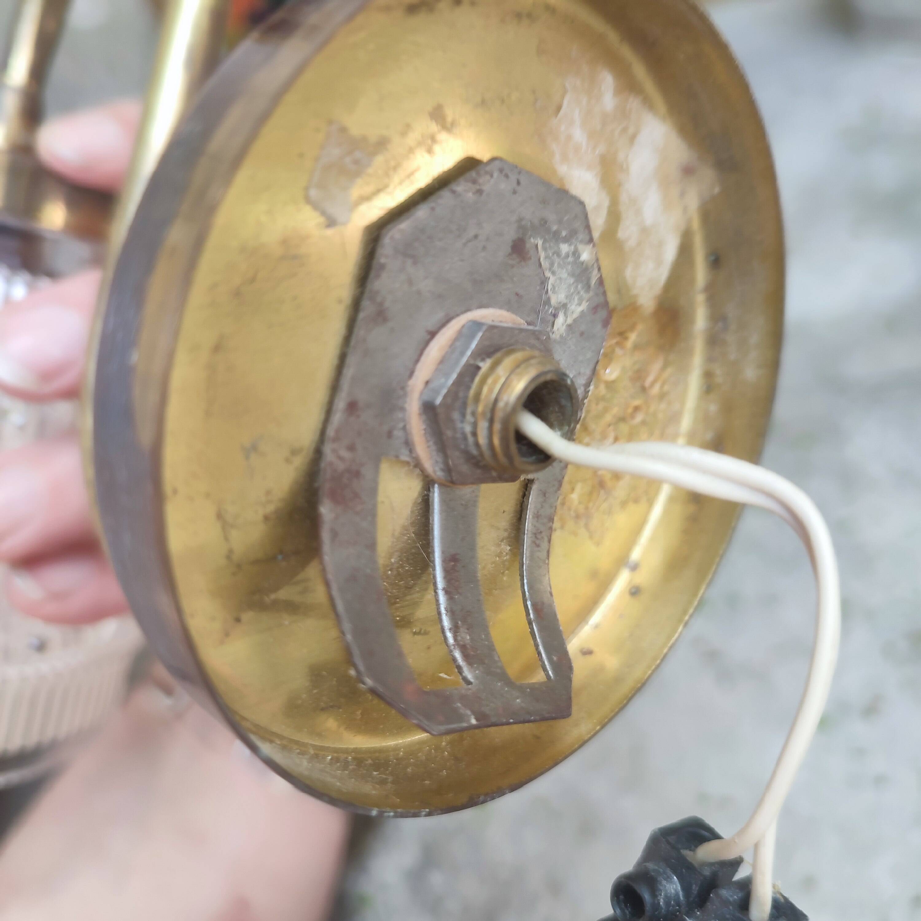 Pair of cylindrical tulip wall lights from the 1950s.