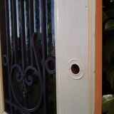 Porte d’entrée ancienne en chêne vitrée grilles en fonte 1925