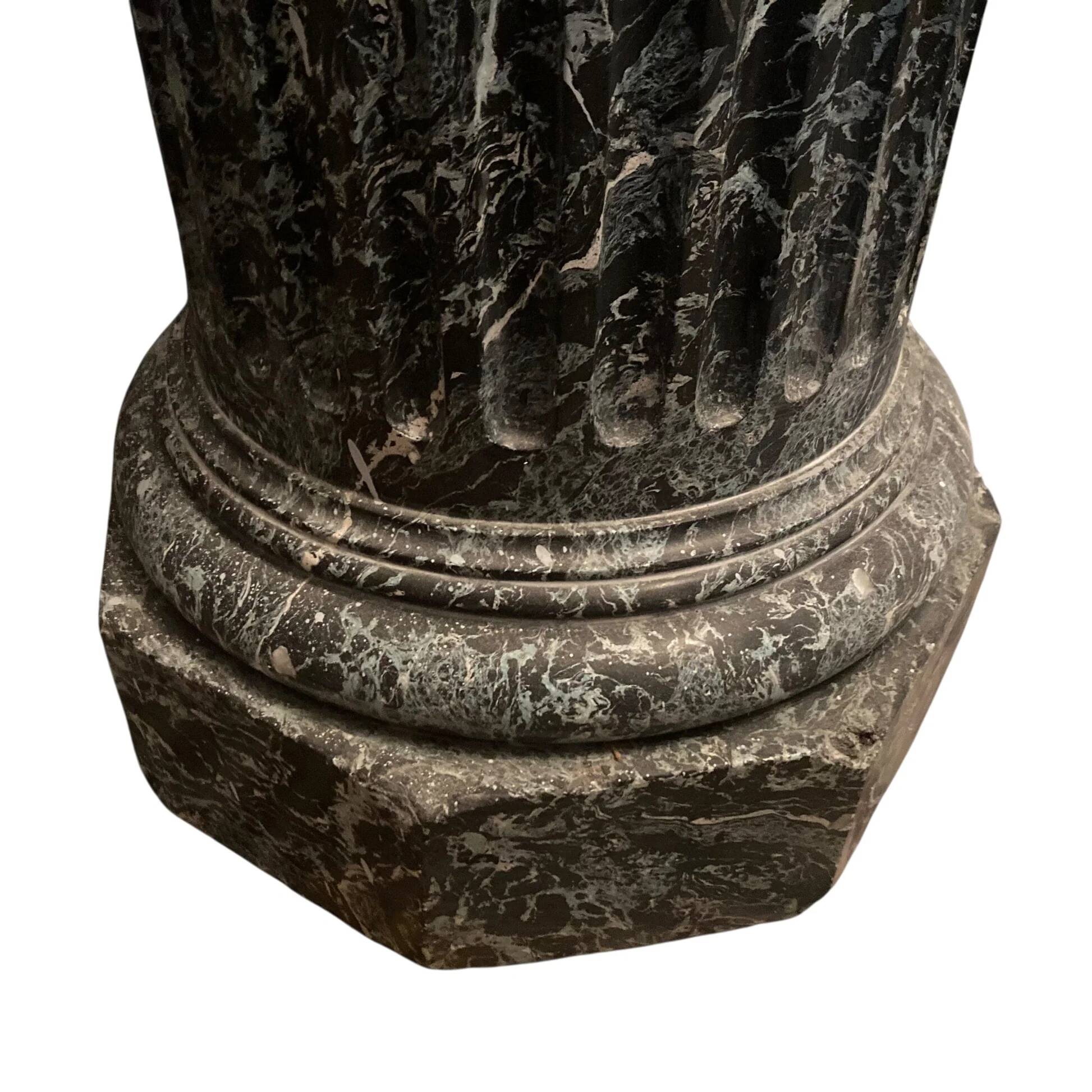 Pair of black and green scagliola columns from the 19th century.