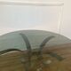 Round smoked glass coffee table from the 70s