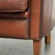 Timeless armchair made of sheepskin leather with a English look