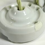 "Rise and fall" suspension in opaline and porcelain