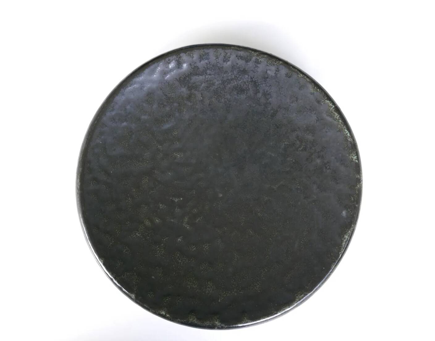 Round Accolay plate in black ceramic, 1960s centrepiece.
