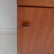 Modern mid-century teak sideboard with brass details.