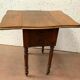 Table de chevet a battant en noyer XX siècle