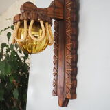 Sconce in wood and yellow glass ball from the 1960/1970