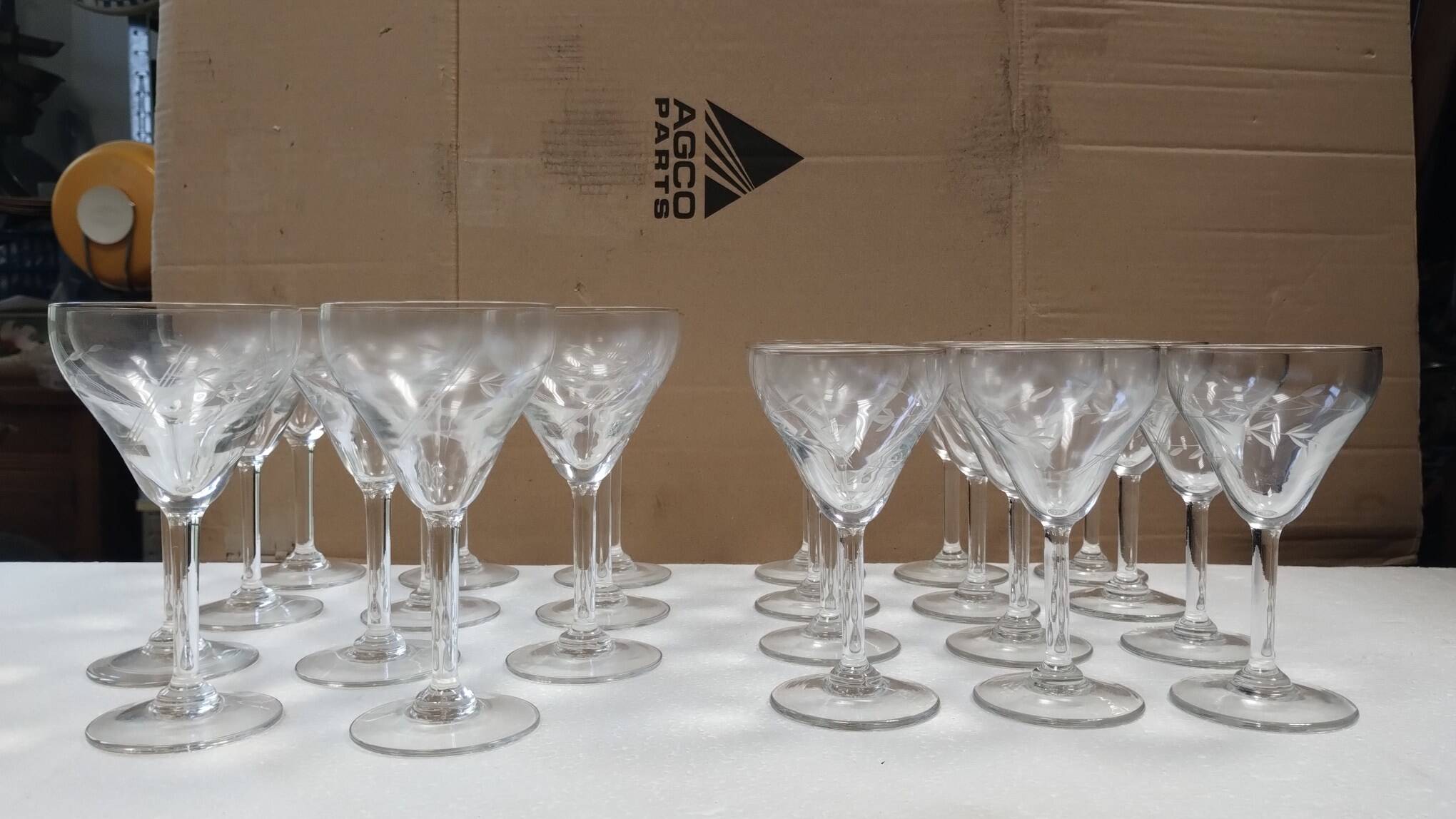 set of 23 champagne glasses or wine glasses in chiseled crystal.