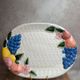 Vintage oval serving dish in majolica – Relief fruit decoration and woven basket design.