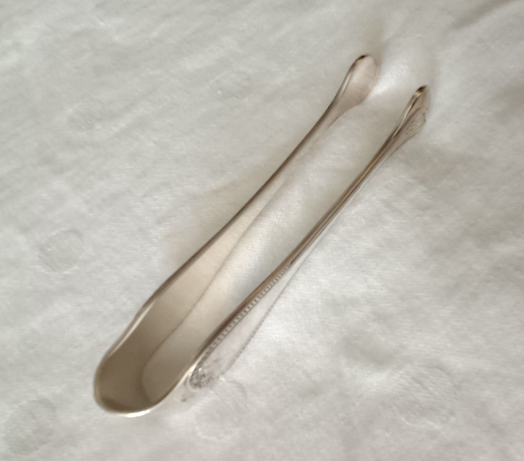 Christofle silver metal sugar tongs model "Malmaison"