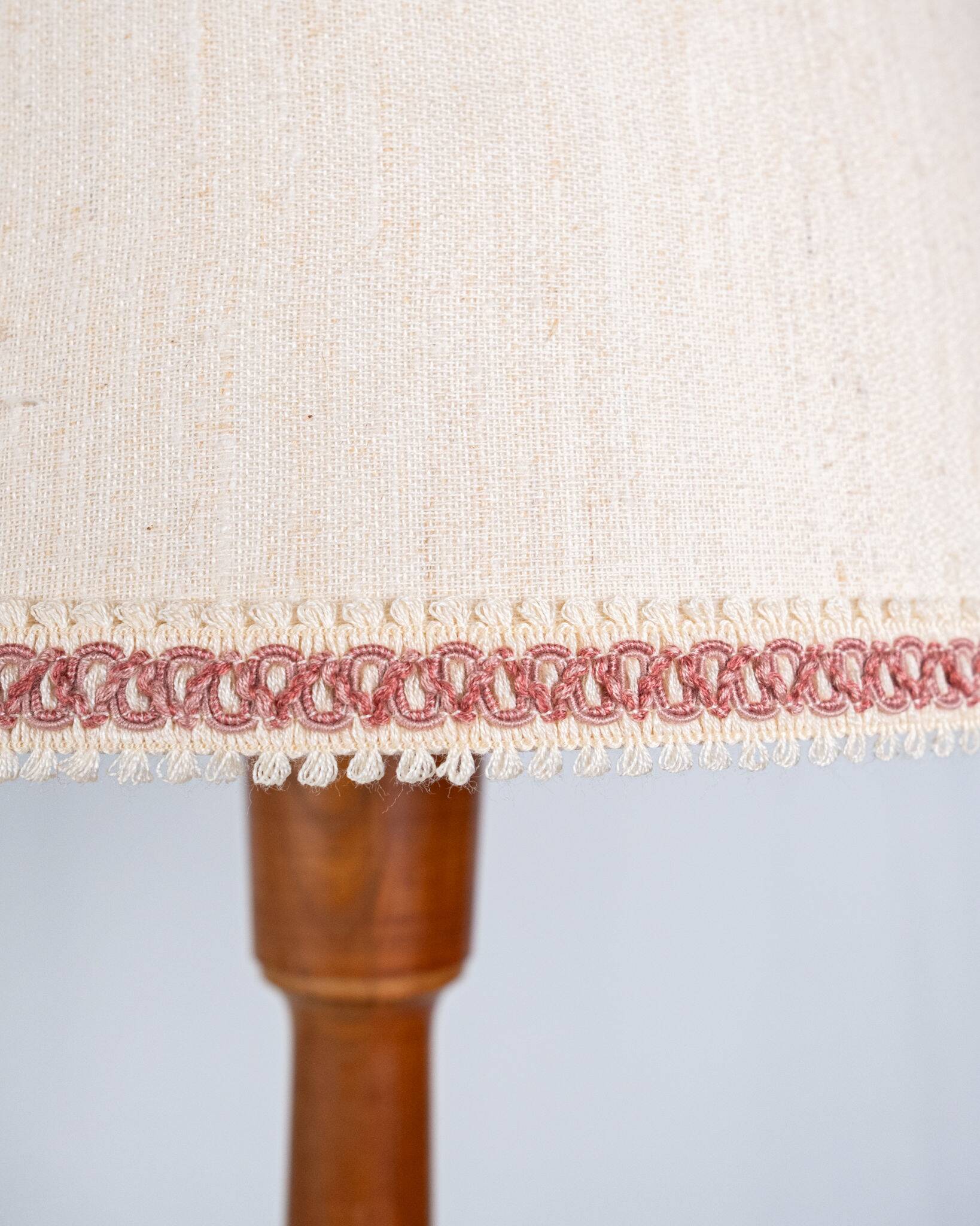 Pair of turned wooden floor lamps in Art Deco style, France, mid-20th century.