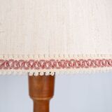 Pair of turned wooden floor lamps in Art Deco style, France, mid-20th century.