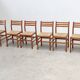 Set of six walnut and rattan dining chairs