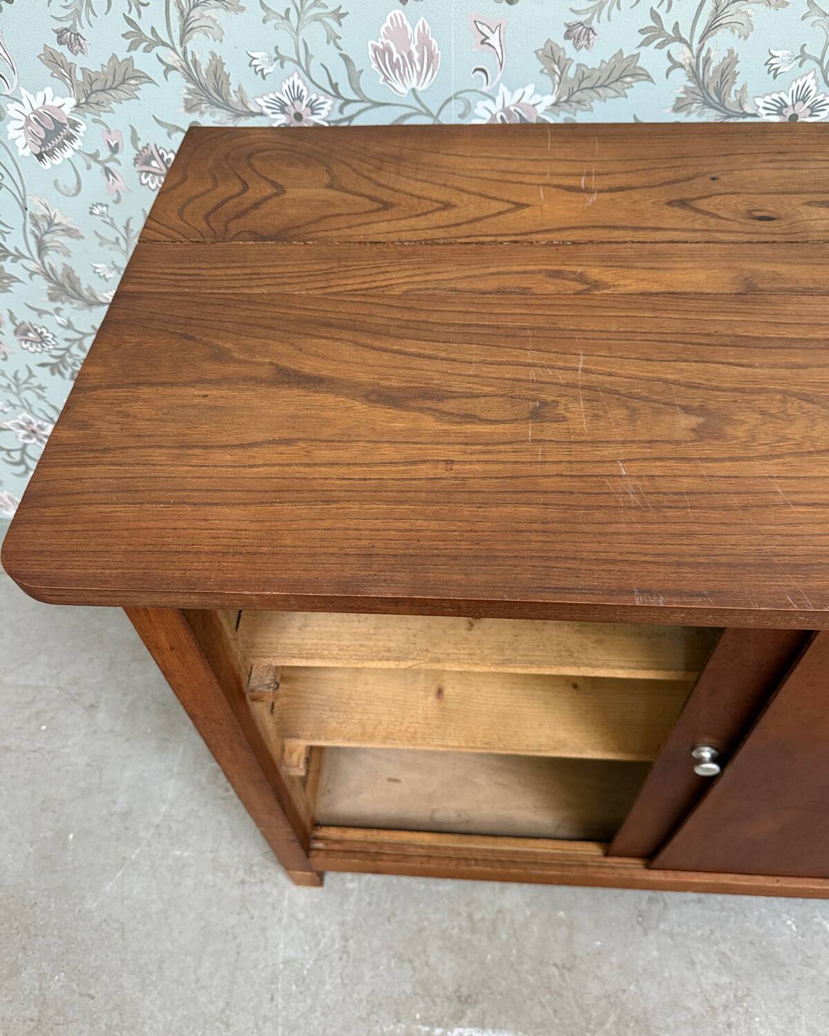 Vintage sideboard with sliding doors